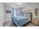 Cozy bedroom featuring a comfortable bed, calming decor, a soft light, and a window for natural light at 1880 Bacons Bridge Rd, Summerville, SC 29485