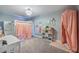 Cute bedroom featuring a bunk bed, modern chandelier, and plenty of decor to make it feel like home at 1880 Bacons Bridge Rd, Summerville, SC 29485