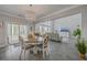 Cozy dining area with stylish chandelier and seamless access to the adjacent living space at 1880 Bacons Bridge Rd, Summerville, SC 29485