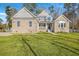 Charming two-story home with a well-manicured lawn and appealing brick and vinyl siding at 1880 Bacons Bridge Rd, Summerville, SC 29485
