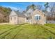 Charming two-story home with a well-manicured lawn and appealing brick and vinyl siding at 1880 Bacons Bridge Rd, Summerville, SC 29485