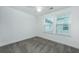 Carpeted bedroom with natural light and neutral walls at 2007 E Patterson Pt, Hanahan, SC 29410