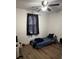 Cozy bedroom with wood flooring, natural lighting, and a ceiling fan at 2326 Kent Ave, North Charleston, SC 29405