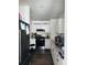 Modern kitchen with stainless steel appliances, white cabinetry, and granite countertops at 2326 Kent Ave, North Charleston, SC 29405