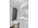 Standard bathroom with tile flooring, combination tub and shower, white cabinets and toilet, and light gray walls at 2362 Parsonage Rd # 2G, Charleston, SC 29414