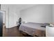 Bedroom with wood flooring, desk and chair, decorated with a clean, neutral color palette, perfect for a calm and restful ambiance at 2362 Parsonage Rd # 2G, Charleston, SC 29414