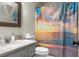Bathroom features a patterned shower curtain and a granite-style countertop at 2608 Hidden Cove Dr, Moncks Corner, SC 29461