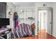 Bedroom featuring custom closet storage and hardwood floors at 2608 Hidden Cove Dr, Moncks Corner, SC 29461