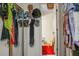 Bright hallway showcasing decorative hats, accessories, and a view into a clean, organized bathroom at 2608 Hidden Cove Dr, Moncks Corner, SC 29461
