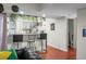 A modern kitchen with a breakfast bar, sleek stools, and stylish decor at 2608 Hidden Cove Dr, Moncks Corner, SC 29461