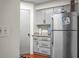 Well-lit kitchen featuring modern appliances, granite countertops, and custom cabinets at 2608 Hidden Cove Dr, Moncks Corner, SC 29461