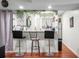 Open concept kitchen bar with barstool seating with a view into the kitchen and appliances at 2608 Hidden Cove Dr, Moncks Corner, SC 29461
