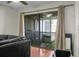 Screened-in porch with view of green space and neighborhood at 2608 Hidden Cove Dr, Moncks Corner, SC 29461