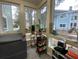 Bright home office featuring large windows, modern decor, and a dedicated workspace at 276 Alexandra Dr # 6, Mount Pleasant, SC 29464