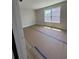 Bright bedroom with a large window and light walls at 314 Quiet Cove Trl, Summerville, SC 29486