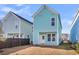 Backyard view, showcasing the layout with back door access at 326 Ripple Park Dr, Summerville, SC 29486