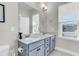 Bright bathroom with double sink vanity, large mirror, and ample counter space and great natural light at 326 Ripple Park Dr, Summerville, SC 29486