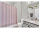 Stylish bathroom featuring a decorative mirror, and a shower with a striped curtain at 326 Ripple Park Dr, Summerville, SC 29486