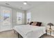 Comfortable bedroom with ceiling fan, exterior doors, and ample natural light at 326 Ripple Park Dr, Summerville, SC 29486
