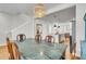 Traditional dining room with view into modern kitchen with stainless appliances and an eat-in kitchen island at 326 Ripple Park Dr, Summerville, SC 29486