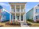 Inviting two-story home with a spacious double porch perfect for relaxing outdoors at 326 Ripple Park Dr, Summerville, SC 29486