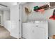 Laundry room with newer appliances, storage shelves, and easy access to bedrooms at 326 Ripple Park Dr, Summerville, SC 29486