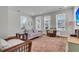 Cozy living room with natural light and chic furnishings, creating a welcoming space at 326 Ripple Park Dr, Summerville, SC 29486