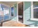 Exterior porch with ample light overlooking a bedroom with an attached bathroom at 326 Ripple Park Dr, Summerville, SC 29486