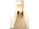 Bright hallway with carpet floors leading to a dining area and living room at 3406 Mariners Way, Moncks Corner, SC 29461