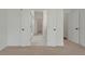 Elegant bathroom showcasing marble flooring, glass shower, and access to walk-in closet and bedroom at 351 Blue Oak Dr, Moncks Corner, SC 29461