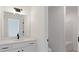 Bright bathroom with white cabinetry, modern fixtures, and a separate toilet room at 351 Blue Oak Dr, Moncks Corner, SC 29461