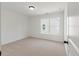 Light-filled bedroom featuring carpet floors and large window at 351 Blue Oak Dr, Moncks Corner, SC 29461