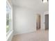 Bright bedroom with a view into the ensuite bathroom at 351 Blue Oak Dr, Moncks Corner, SC 29461