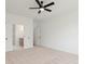 Spacious bedroom featuring ensuite bathroom and walk-in closet with neutral carpeting and modern finishes at 351 Blue Oak Dr, Moncks Corner, SC 29461