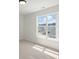 Light-filled bedroom with large window and neutral carpet, offering great views of the neighborhood at 351 Blue Oak Dr, Moncks Corner, SC 29461
