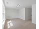 Bright, empty bedroom with neutral carpet, a ceiling light and a bright window at 351 Blue Oak Dr, Moncks Corner, SC 29461