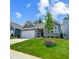 Single-story home featuring manicured front lawn and curb appeal in a suburban neighborhood at 351 Blue Oak Dr, Moncks Corner, SC 29461