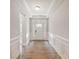 Inviting hallway with decorative trim and hardwood floors at 351 Blue Oak Dr, Moncks Corner, SC 29461