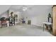 Spacious attic with ample room for storage, featuring neutral carpeting and a ceiling fan at 3518 Gatetree Rd, Johns Island, SC 29455
