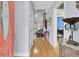 Inviting entryway with hardwood floors, blue walls, and a view into other rooms at 3518 Gatetree Rd, Johns Island, SC 29455