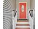 Close-up of a bright red front door with decorative glass and white trim at 3518 Gatetree Rd, Johns Island, SC 29455
