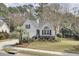 Lovely home with a two-car garage, beautiful front yard, and mature landscaping at 3518 Gatetree Rd, Johns Island, SC 29455