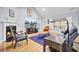 Bright living room with a fireplace, hardwood floors, and lots of natural light at 3518 Gatetree Rd, Johns Island, SC 29455