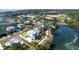 Stunning aerial view of an upscale neighborhood with a golf course, pond, and marsh in the background at 4176 Victory Pointe Dr, Mount Pleasant, SC 29466