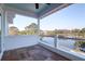 Balcony with plank flooring, white railing, and a beautiful water view at 4176 Victory Pointe Dr, Mount Pleasant, SC 29466