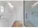 Bathroom with double vanity, large mirror, wood floors, and glass shower at 4176 Victory Pointe Dr, Mount Pleasant, SC 29466