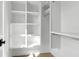Organized walk-in closet with custom shelves and rods for ample storage at 4176 Victory Pointe Dr, Mount Pleasant, SC 29466