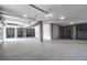Spacious three car garage features ample storage, concrete flooring and recessed lighting at 4176 Victory Pointe Dr, Mount Pleasant, SC 29466