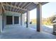 Covered outdoor space with view of pond and wooded area that's perfect for entertaining guests at 4176 Victory Pointe Dr, Mount Pleasant, SC 29466