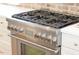 Close up of stainless steel range with multiple burners and professional-grade features at 4176 Victory Pointe Dr, Mount Pleasant, SC 29466